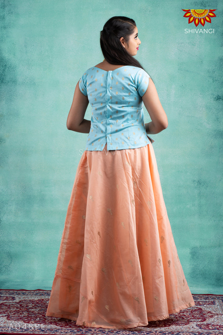 Girls Peach Chanderi Tulip Pattu Pavadai